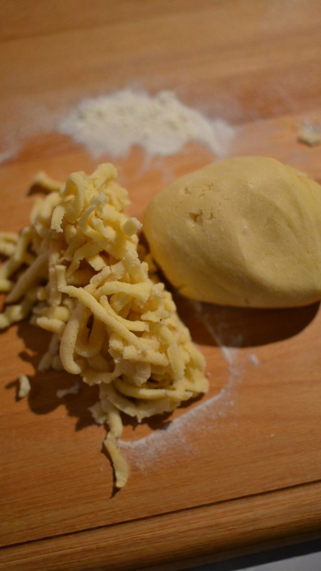 Grate the remaining dough over the top and bake