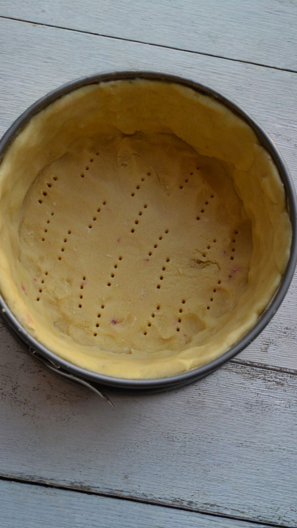 Line the tin with the dough